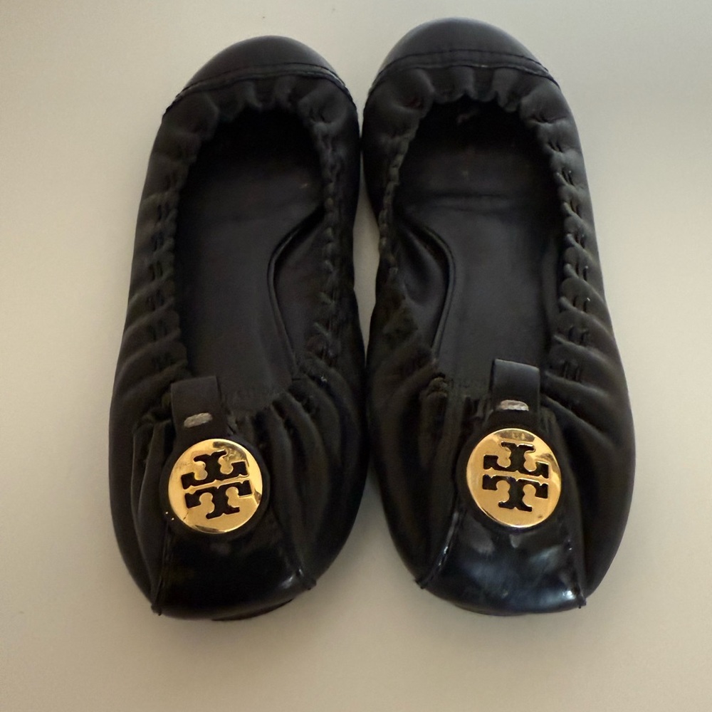Tory Burch Black and Gold Flats with Signature Logo